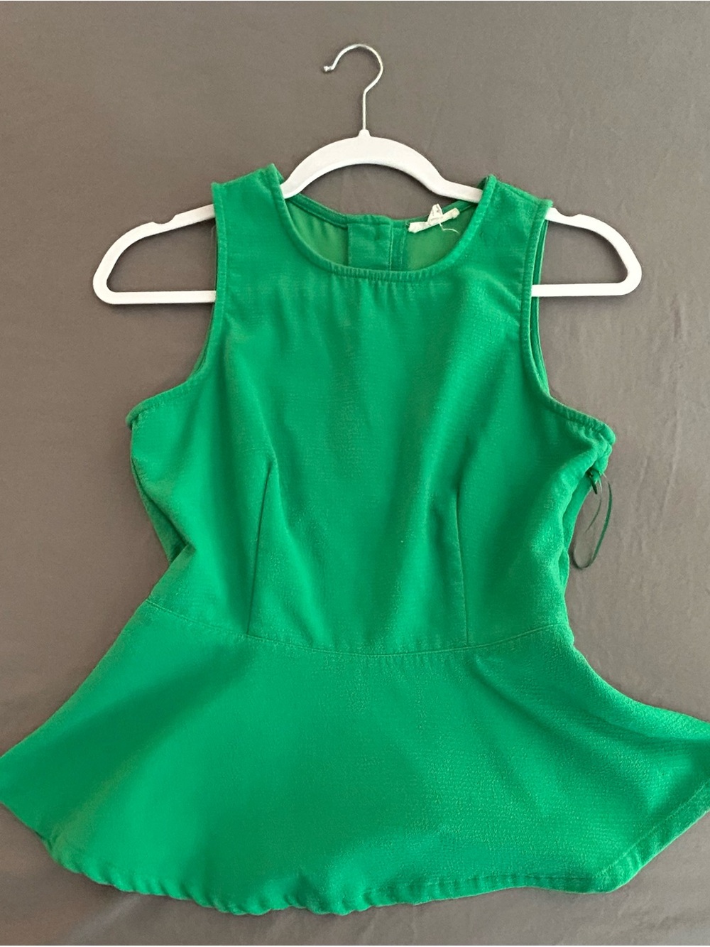 Sleeveless Peplum Blouse in Green